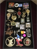 Tray lot of keychains, buttons and more