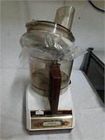 Vintage Sunbeam food processor with attachments