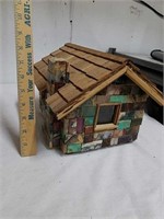 Miniature cabin with tile walls