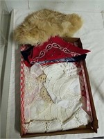 Fur shawl with doilies and handkerchiefs
