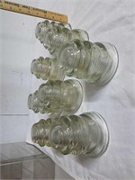 8 vintage glass insulators