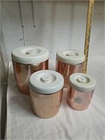 Set of four vintage West Bend metal canisters