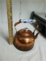 Vintage copper teapot with porcelain handles