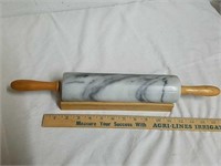 Marble rolling pin on wood stand