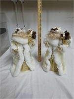 Pair of decorative Santa Claus tree toppers