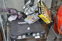 Early Nintendo 64 game console with controller,