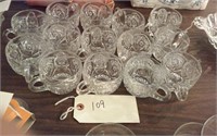14 matching early pressed glass punch cups