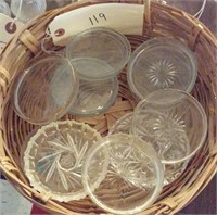basket of old glass drink coasters