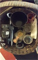 basket with old shot glasses, corkscrew, etc