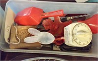 tub of old kitchen molds, scoops, timer, utensils