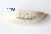 Scrimshaw sperm whale tooth with engraved