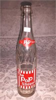 Vintage "The pop shop" glass pop bottle 9.75 in