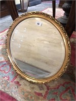 ROUND GILT FRAMED MIRROR