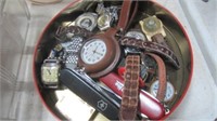 TIN OF WATCHES AND KNIVES