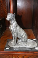 Silver painted resin figurine of a lepoard