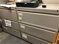 Two matching, large three drawer file cabinets