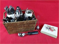Wicker Basket with Silverware and Ceramic Trivets