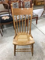 Cane seat pressed back chair