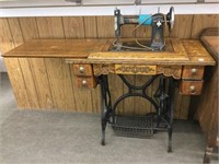Raymond oak cabinet sewing machine