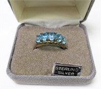 Sterling silver five-stone blue topaz ring