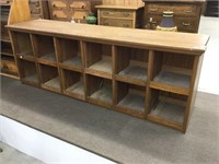 Oak storage cabinet with tilt shelves