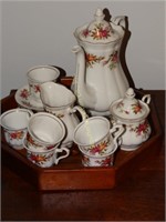Tea set:  6 cups, 6 saucers, creamer, sugar &