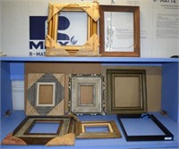 Seven Wooden Frames And One Metal Frame