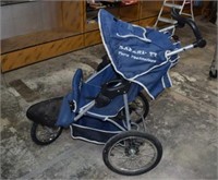 Jogging Stroller Marked "Safari Turn Technology"