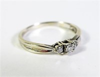 10K White gold three-stone diamond ring