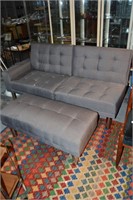 Modern 2 seater sofa which reclines into a day bed