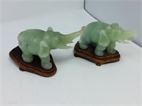 pair of jade like elephants on stands