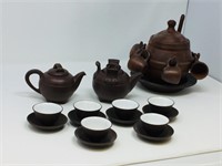 small brown ceramic tea set & saki set