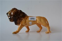 Beswick figure of a prowling lion,