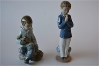 2 x Nao figurines 'Boy Resting on Excursion',