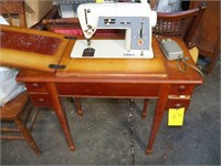 Singer Sewing Machine with wooden cabinet