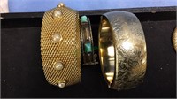 2 gold tone costume bracelets, mesh and wide band