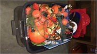 Tote with lid full of Christmas decorations,
