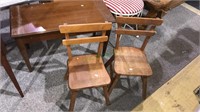 Pair of children chairs and a bench with a lift