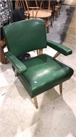 Green vinyl modern rocking armchair, 24 inches