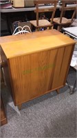 Pine serving cabinet with two sliding doors and