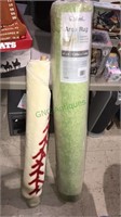 Light green 4’ x 6’ area rug new in the plastic