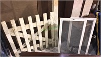 Wood yard gate with one post, two wood screens,