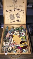 Wood box full of Pinback buttons and bolts wagon