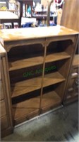 Oak three shelf bookcase with two drawers in the