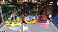 Three Barbie figures in the original boxes, Ken