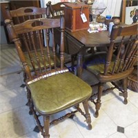 drop leaf table w/ 4 chairs& items on top of table
