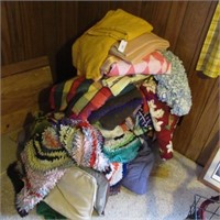 Pile of blankets & rugs, latch hook flag