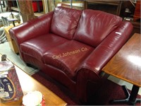 RED LEATHER LOVESEAT