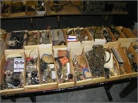 Table full of antique radio parts