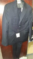 Boys dark pinstripe suit. Wool and cashmere. Size